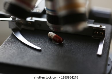 Prill tablet microscope background laboratory is a study human biology analyzes for non-compliance with the requirements organization public health biologically active additives - Shutterstock ID 1185964276