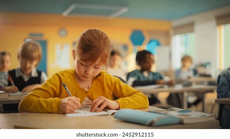 Primary School Children Working on a Test Assignment in Class: Smart Diverse Kids Focused on Exercises, Thinking, Searching for a Correct Solution. Schoolchildren Getting Modern Education - Powered by Shutterstock