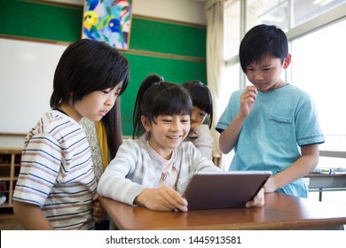 
Primary School Student Who Uses Tablet