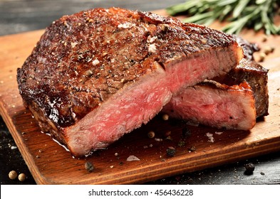 Prime Black Angus Ribeye Steak. Medium Rare Degree Of Steak Doneness.