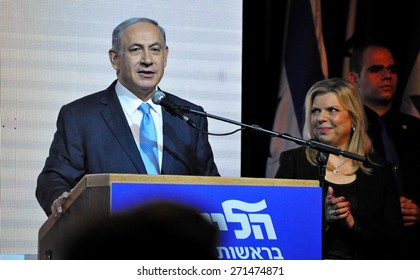 Prime Minister Of Israel Benjamin Netanyahu With His Spouse Sarah Next To Him Speaking At The End Of The Election Day On March 17, 2015. Stock Photo, Stock Image, Illustration.