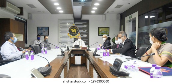 The Prime Minister, Shri Narendra Modi Holds Review Meeting With The Officials After His Aerial Survey Of Areas Of Gujarat And Diu Affected By Cyclone Tauktae On May 19, 2021.