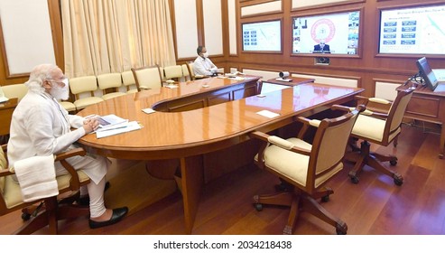 The Prime Minister, Shri Narendra Modi chairing the 37th PRAGATI meeting, in New Delhi on August 25, 2021. - Shutterstock ID 2034218438