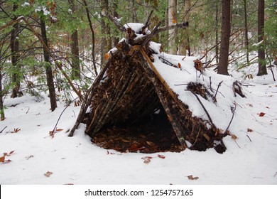 Primitive Survival A Frame Debris Shelter In The Cold Winter Snow.  Located In The Blue Ridge Mountains Of Western North Carolina. 