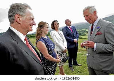 Prince Charles At An Apple Juice Farm In Crickhowell. Prince Charles Visit's John And Margaret Morris In Crickhowell, Powys, Wales, Where They Make Their Own Apple Juice, On The 3rd Of July 2014.