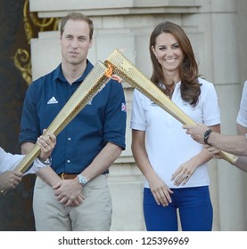 Prince William And Catherine, Duchess Of Cambridge Welcome The Olympic Torch To Buckingham Palace, London, UK. July 26, 2012.