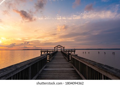 Prince William County, Virginia 6/20/2020: Leesylvania State Park fishing pier with a colorful sunrise