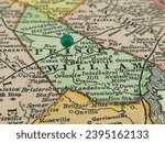 Prince William County, Virginia marked by a green tack on a colorful vintage map. The county seat was located in Brentsville, VA from the year 1820 until 1894.