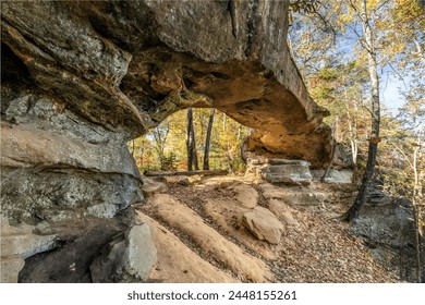 Princess Arch, surrounded by fall color, is one of many natural rock formations found in Red River Gorge National Geological Area, a popular attraction for tourism and hiking in eastern Kentucky. - Powered by Shutterstock