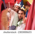Princess play, dad portrait and kid fun in a bedroom fort with costume, girl and king dad together. Castle, happiness and smile with father and child in a home feeling excited and happy about a game