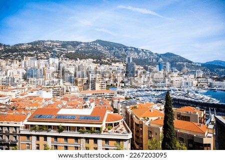 Principality of Monaco. Beautiful panoramic views over Monaco, landscape of golden hours. Views of the apartment building, casino, large port with luxury yachts. Monaco is a popular tourist destinatio