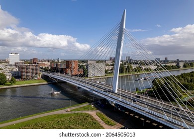 Prins Clausbrug cable bridge city access to Utrecht industrial area with the residential neighbourhood and cargo vessel in the foreground. Aerial of infrastructure and Dutch urban transportation