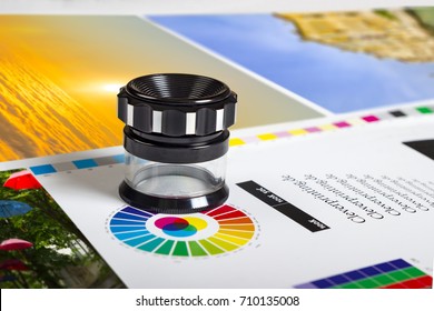Print loupe on offset printed sheet with basic colors controll bars - Shutterstock ID 710135008