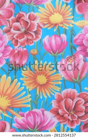 printed blue eva mat features a vibrant pink and yelow floral pattern                                              