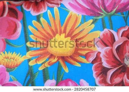 printed blue eva mat features a vibrant pink and yelow floral pattern                                         