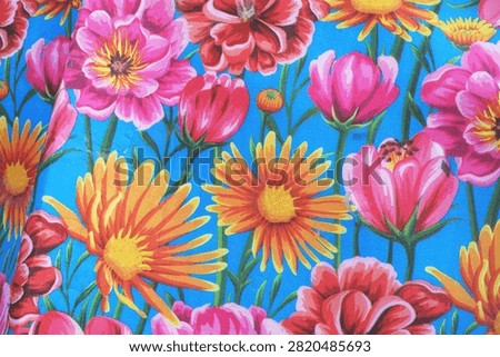 printed blue eva mat features a vibrant pink and yelow floral pattern                                         