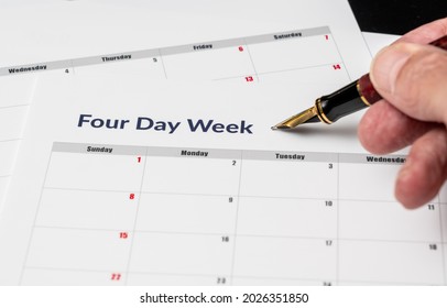 Printed calendar for a 4 day working week showing weekend days in red in new approach to productivity