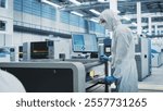 Printed Circuit Board Production At Electronics Factory: Scientist In Sterile Suit Using Soldering Jet Printer To Make Motherboard For Powerful CPUs. Powerful Computer Hardware Manufacturing Facility.