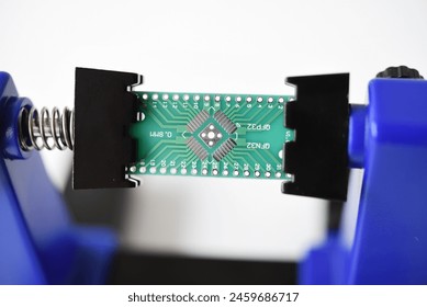 A printed circuit board for trace elements. Radio electronics. A holder for printed circuit boards.