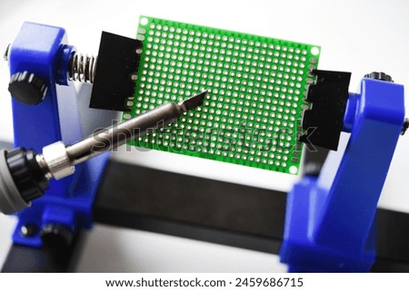 A printed circuit board for trace elements. Radio electronics. A holder for printed circuit boards.
