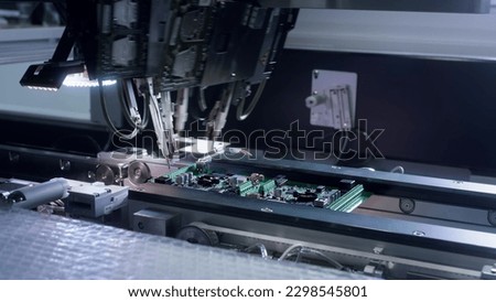Printed circuit board without electronic components ready for assembly. Technological process. Needle automatic equipment diagnose and test chips and processors. Installation of SMD components