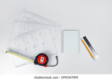 Printed electrical diagram. Design concept, electronics and engineering. Wiring diagram, tape measure, ruler and pencil.