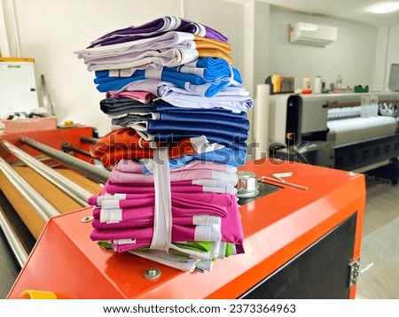 Printed fabric printed by sublimation machine using CMYK color concept.