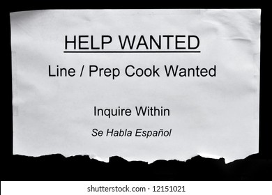 Printed Help Wanted Sign At The Restaurant Window