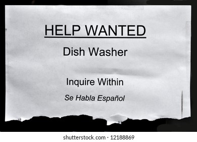 Printed Help Wanted Sign At The Restaurant Window