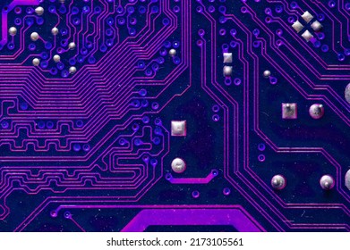 Printed neon purple circuit board. Electronic computer technology. Motherboard digital chip. Background of technical sciences. Built-in communication processor. Information engineering component. - Powered by Shutterstock - Get 15% off with code: PIKWIZARD15