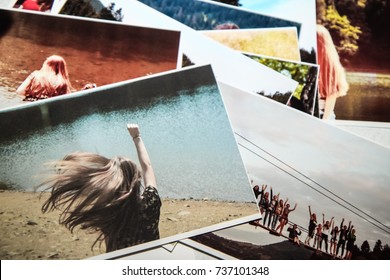 Printed Photos. Girl Power Concept. Sweet Memories. The Girl Running Forward With Raised Hand And Fluttering Hair.
The Way To Success Concept. Desire. Motivation Concept