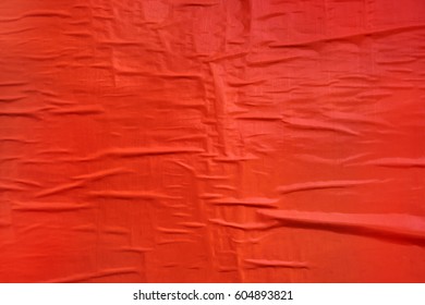 Printed Red Poster Paper Texture, Crumpled Billboard Material Glued To A Wall, Useful As Background