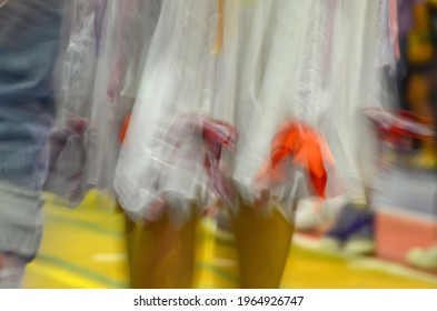 Printed And Very Colorful Round Skirts During Dance At Festa Junina Or June Party Translated Into English. Blur Background.