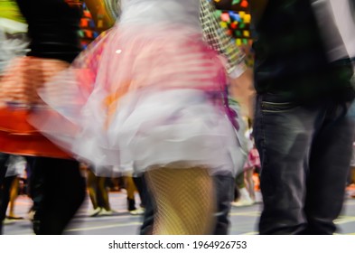 Printed And Very Colorful Round Skirts During Dance At Festa Junina Or June Party Translated Into English. Blur Background.