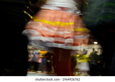 Printed And Very Colorful Round Skirts During Dance At Festa Junina Or June Party Translated Into English. Blur Background.