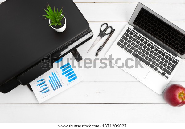 Printer and\
computer. Office table. Top\
view.