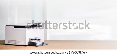 Printer, copier, scanner in office. Workplace ,photocopier machine for scanning document printing a sheet paper and xerox photocopy.