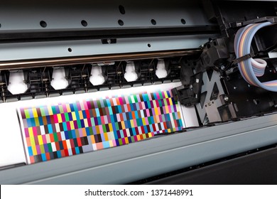 Printer ink jet print machine printing color patches for color management control - Shutterstock ID 1371448991