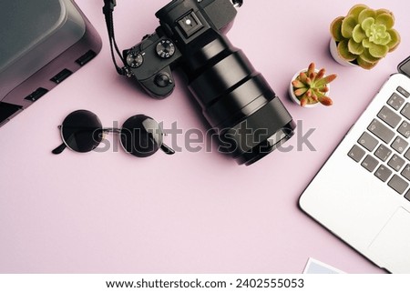 Printer, laptop and camera on table close up. Printing photos