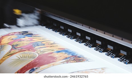 A printer is printing a colorful design on a piece of paper. The design features a variety of shapes and colors, including a large flower and a bird. Scene is vibrant and lively, with the colors