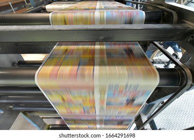 Printing Of Coloured Newspapers With An Offset Printing Machine At A Printing Press Company