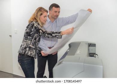 Printing Plans On A Large Format Printer In A Reprography Worksh