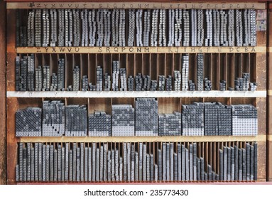 Printing Press Letter Blocks In A Wooden Shelf Printing Industry