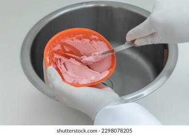 Printing is the process of making the upper and lower jaw molds using dental molding materials (alginate).