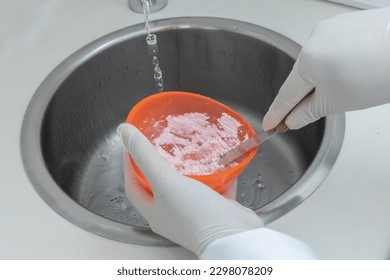 Printing is the process of making the upper and lower jaw molds using dental molding materials (alginate).