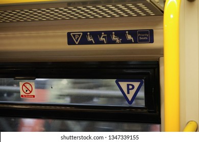 Priority Seats And No Smoking Sign Above Window Of London Train