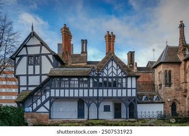 Priory Row Cottages, a historic row of Tudor-style houses located in Coventry, England. These cottages are known for their timber-framed architecture and are a popular tourist attraction. - Powered by Shutterstock