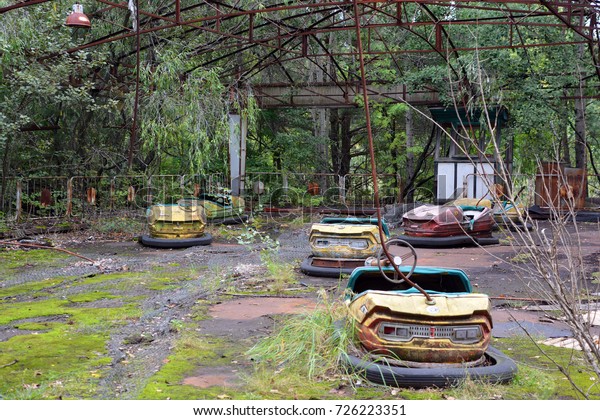 PRIPYAT CHERNOBYL UKRAINE 09 03 17:Bumper cars\
in Ghost City of Pripyat exclusion Zone of Chernobyl accident\
dominates the energy of most disastrous nuclear power plant\
accident in history,