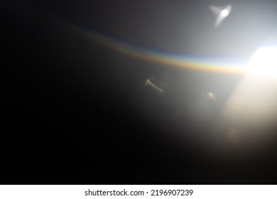 prism light leak texture for photo overlay and effect. lens flare in abstract background. bokeh effect with glow and magical lights on black background. - Shutterstock ID 2196907239