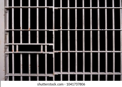 Prison cell bars with black background